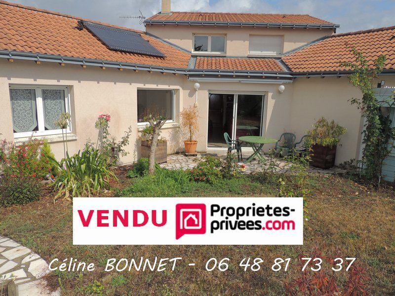 Maison 133m², 4 chambres, garage.