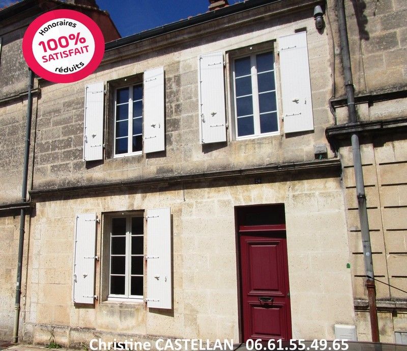 Maison de ville avec garage et jardin
