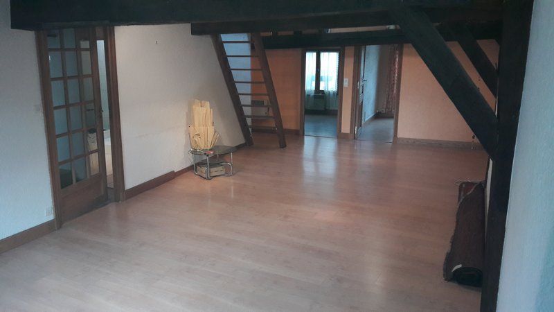 Appartement T4 de 72M² avec poutres apparentes au centre ville