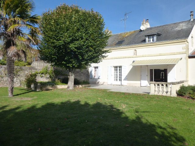 Maison  7 pièce(s) avec 5 chambres  + garage /Atelier sur un terrain clos de 1240m²