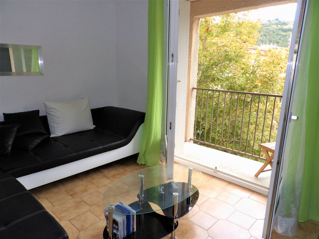 Appartement 67 m2 avec petit balcon, garage, et cave