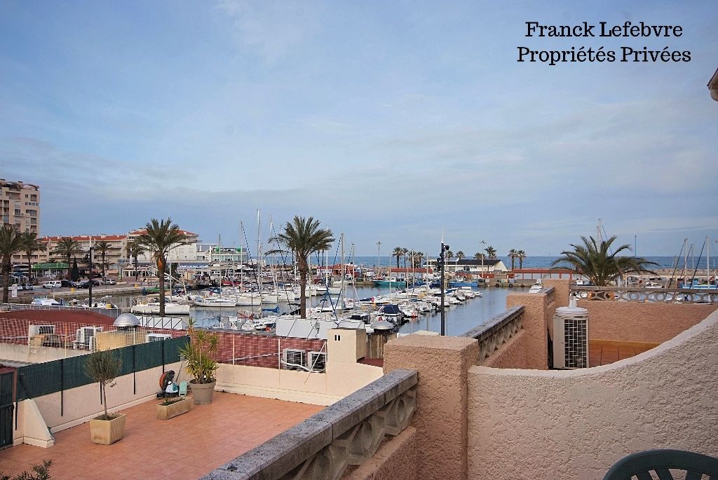 SAINT-CYPRIEN Saint Cyprien port studio avec vue mer avec garage + parking 1