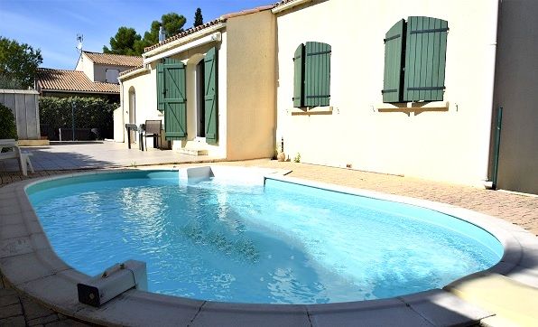 Villa de plain pied 100 m² avec piscine  340 000 - Juvignac 34990