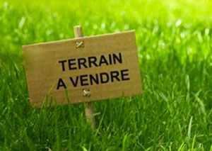 TERRAIN  CONSTRUCTIBLE DE 1000 M² ENVIRON