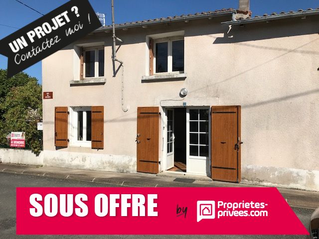 Maison de village 4 chambres garage chai jardin
