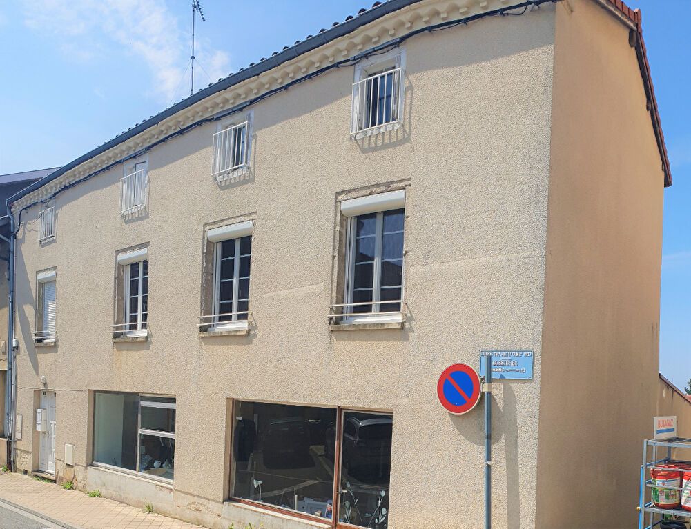 Immeuble avec appartement et local commercial