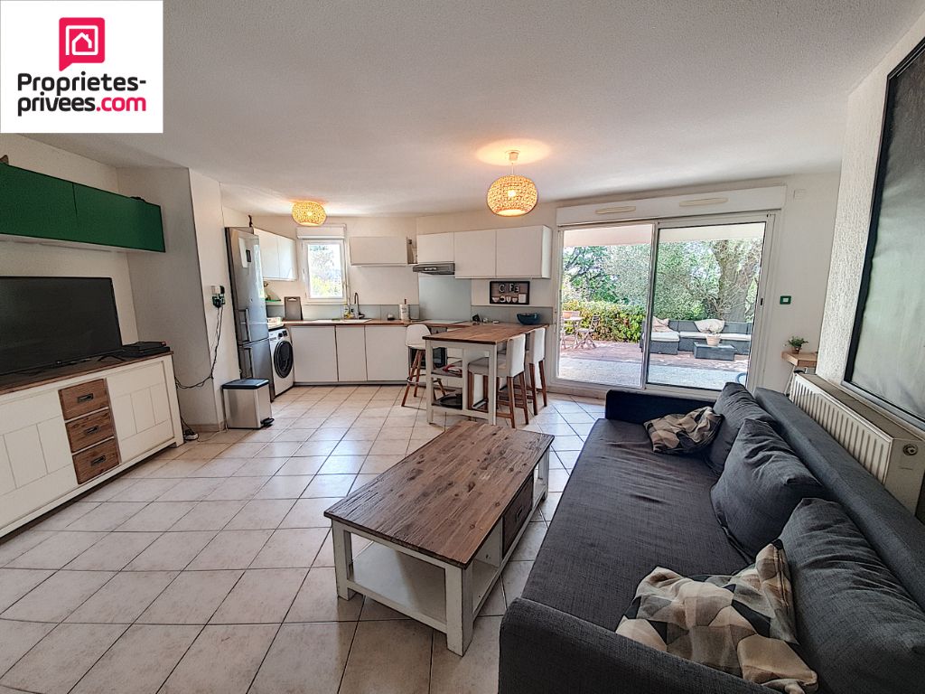 Appartement 2 PIECES 52 m2 JARDIN 2 PLACES PRIVATIVES DE PARKING