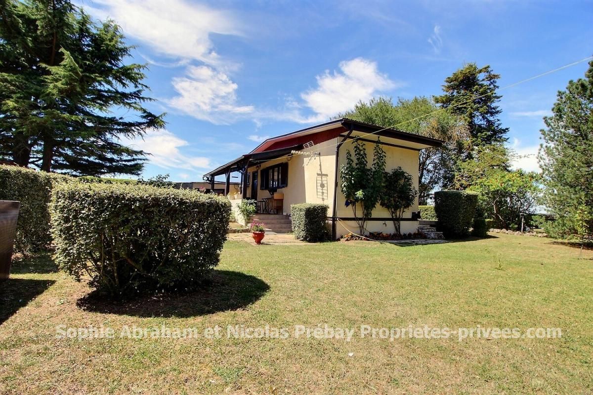 Maison de 2 pièces avec garage et grand jardin arboré