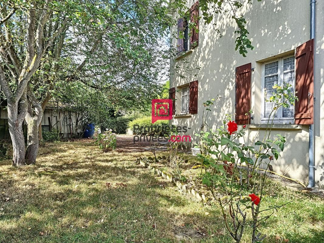 Maison avec grand jardin