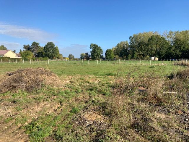 dans un village proche Etrépagny terrain à Bâtir  viabilisé de 1001 m²