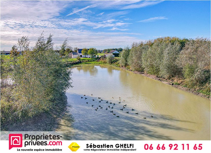 propriété avec plan d'eau sur parcelle d'environ 10 hectares
