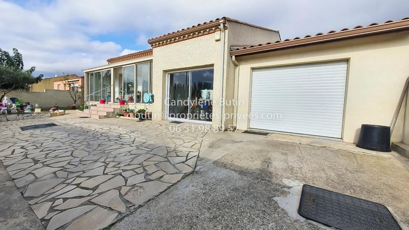 Villa de plain pied avec garage et pièce a aménager