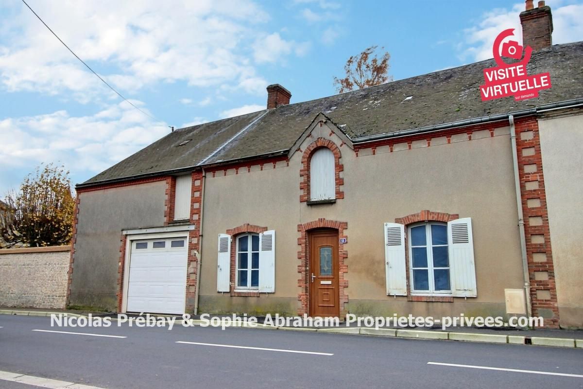 Maison de 4 pièces avec grand garage et terrain clos