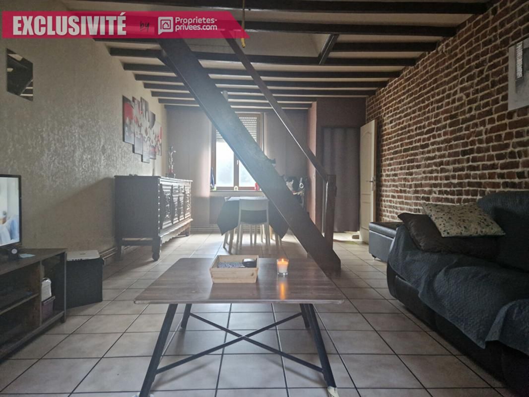 Roubaix Cartigny, Maison 1930 composée de 3 chambres et d'une cour