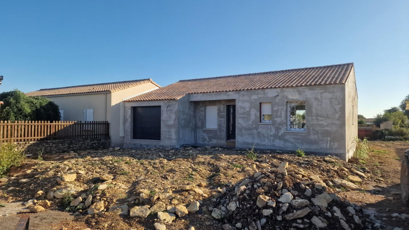 Maison en état futur d'achèvement - 3 chambres - garage avec possibilité de construire une autre maison sur l'arrière