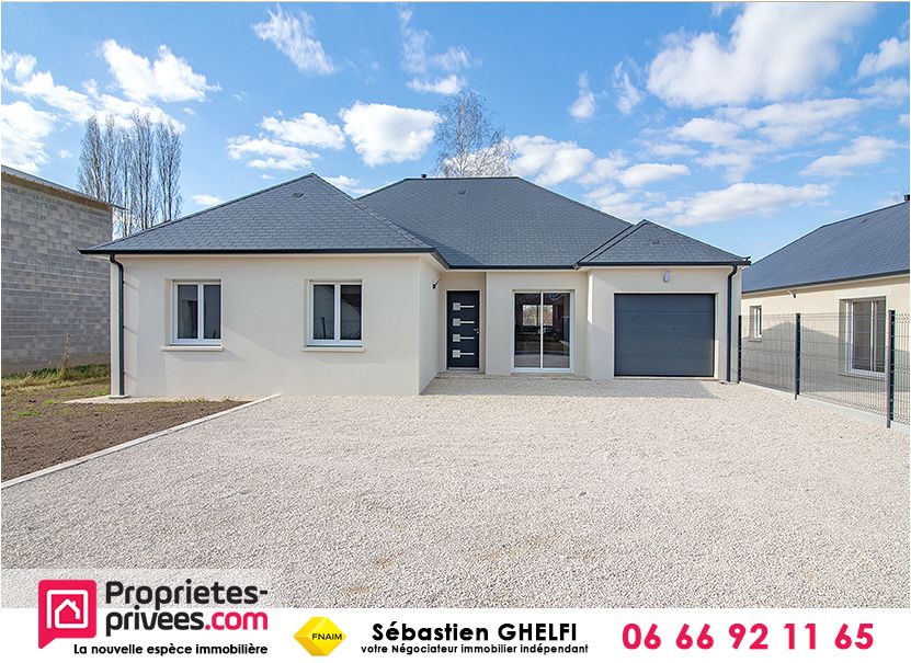 maison de plain pied , grande salle de vie de 60 m², 3 chambres et garage
