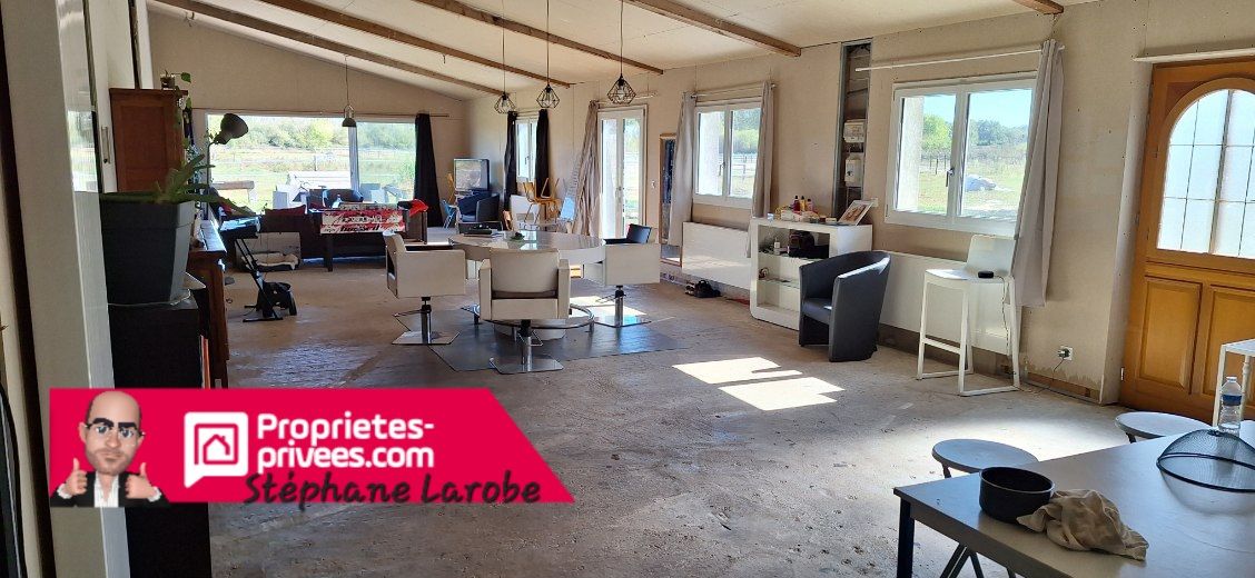 Propriété de 300m2 + 8,5 hectares