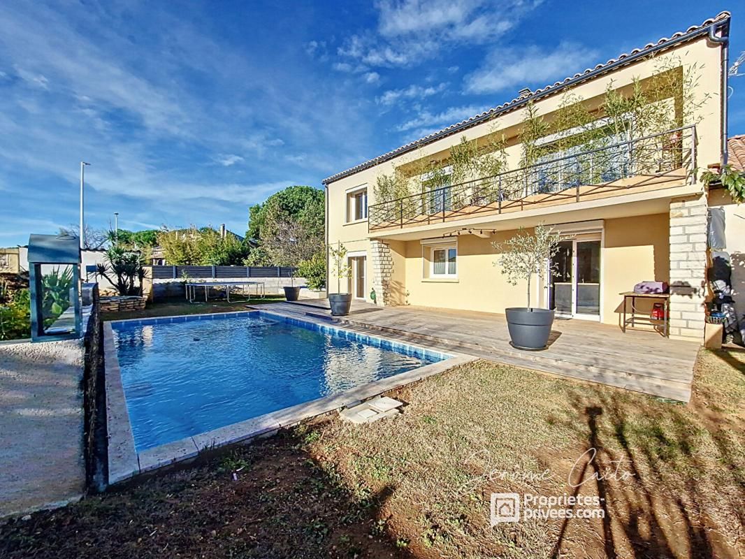 NIMES Maison familiale Garons 5 pièce(s) 145 m2 + double garage et piscine 1