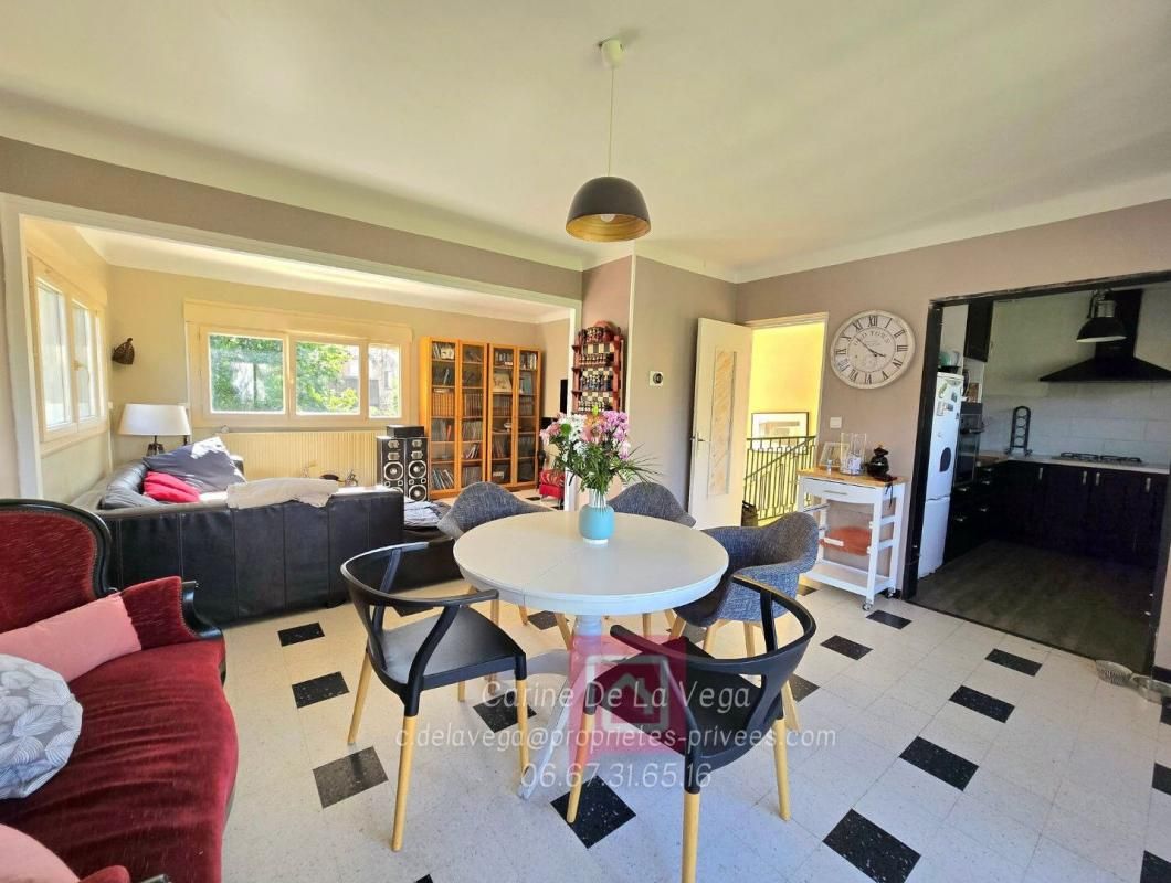 Maison R+1 de 95m² avec double garage et jardin