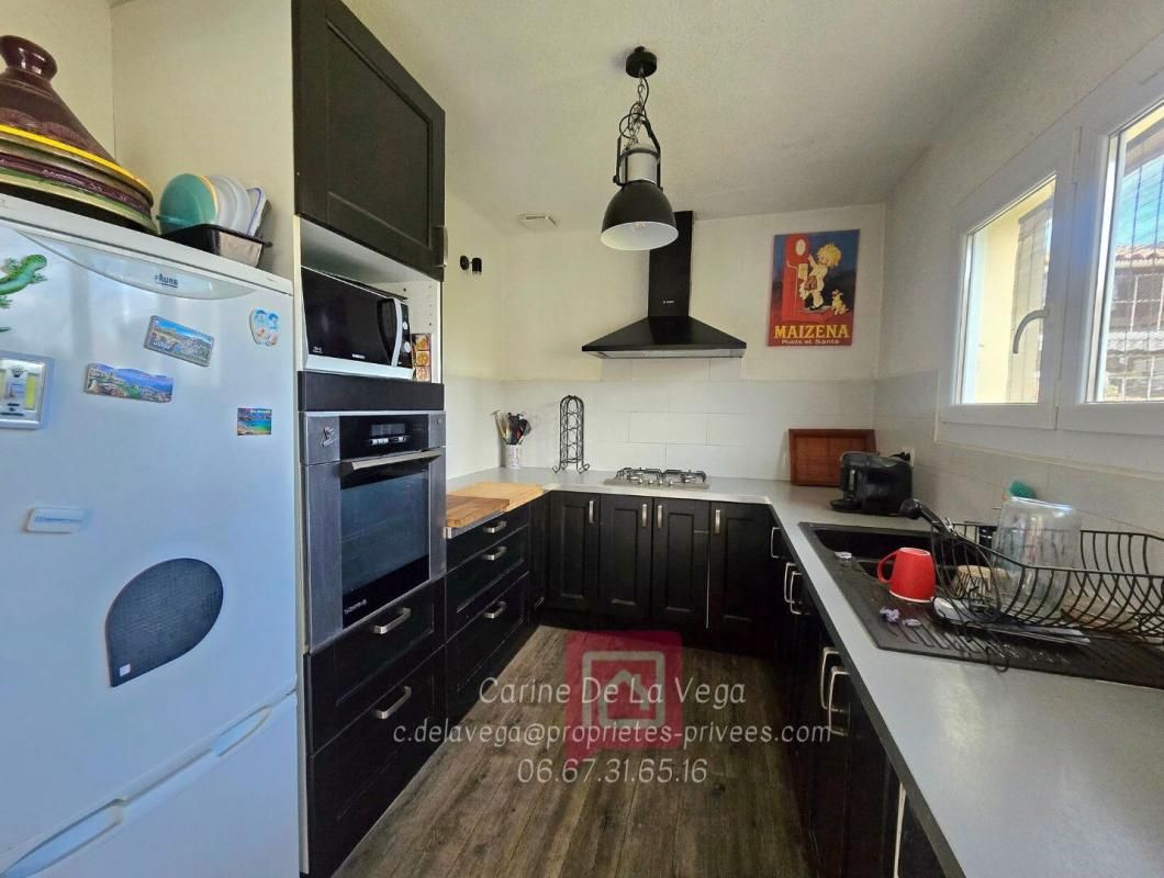 SAINT-THIBERY Maison R+1 de 95m² avec double garage et jardin 3