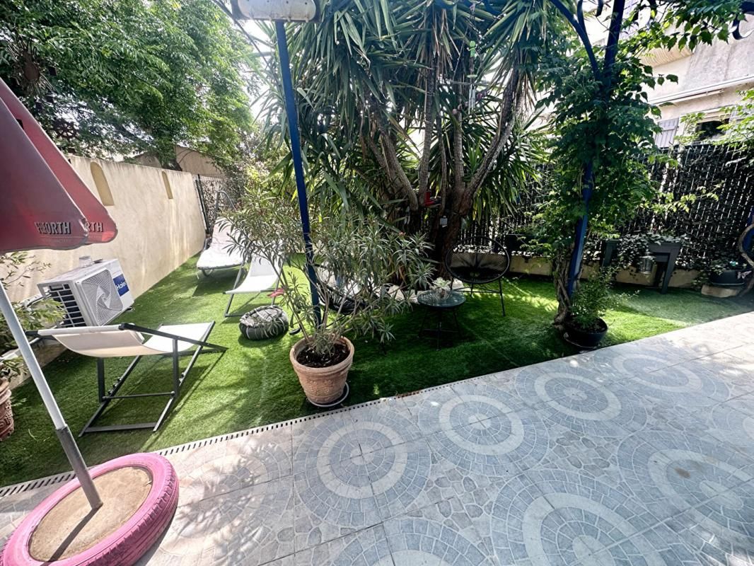 Appartement rez de jardin 77m²