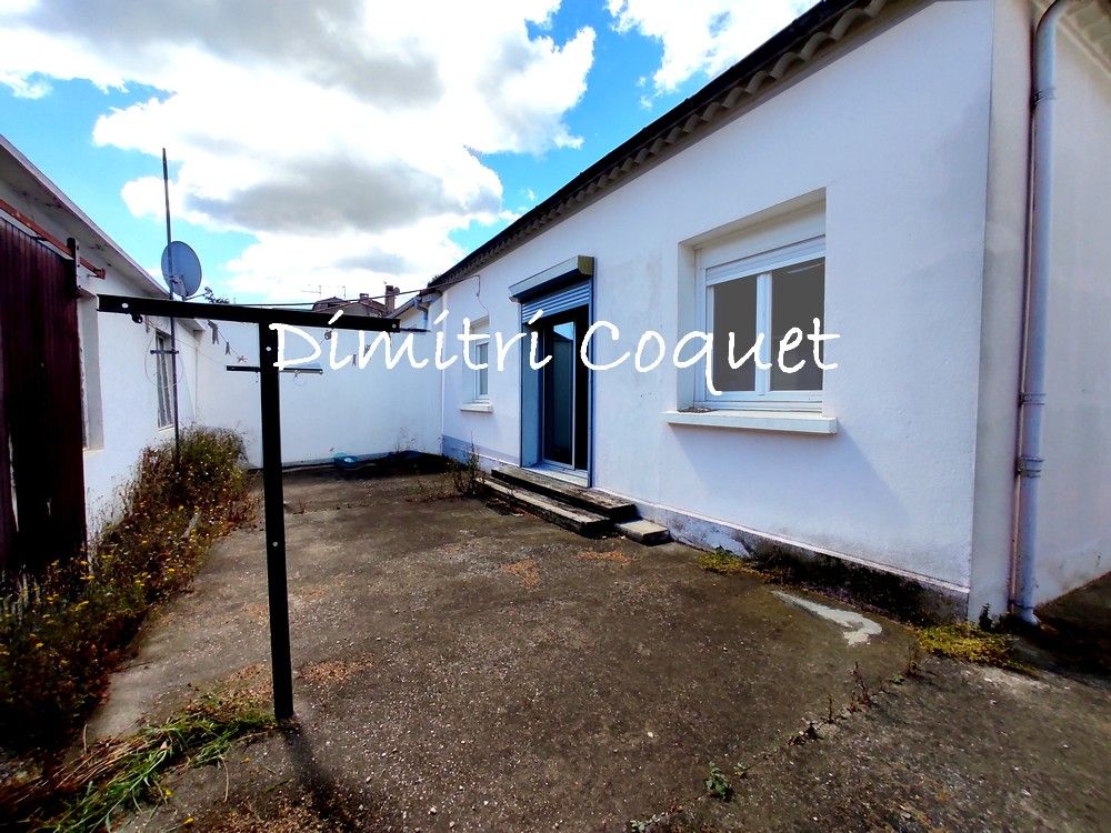 Maison de plain pied avec grand garage