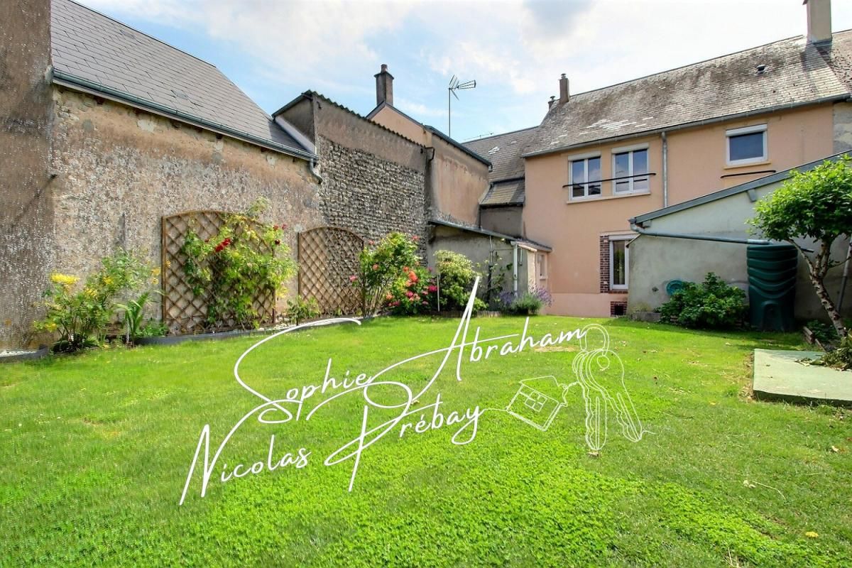 Maison avec jardin, 2 chambres, bureau, garage et cave