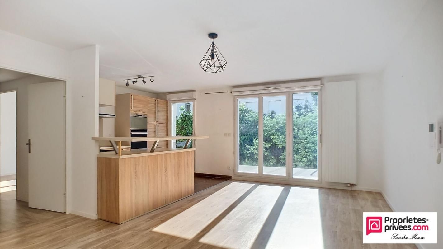 Magnifique appartement avec terrasse et rez de jardin