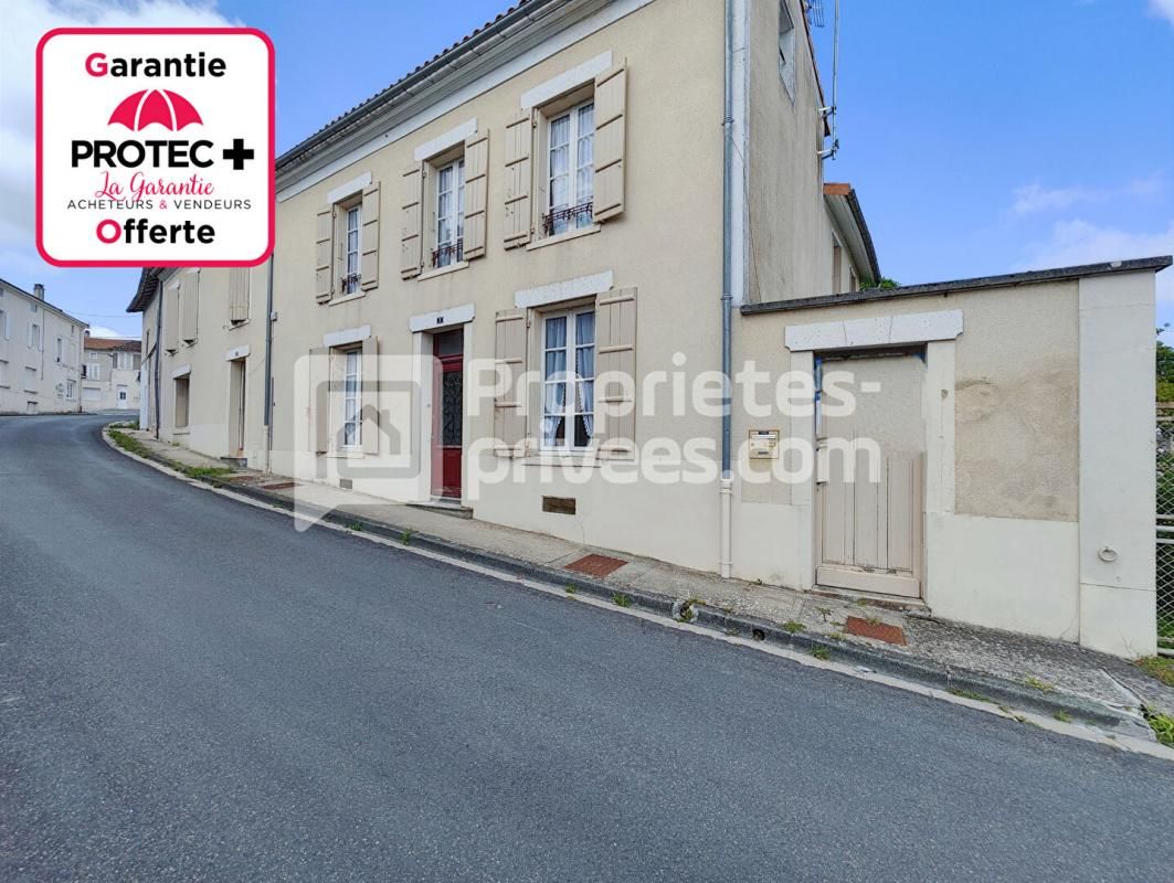 Ensemble immobilier avec 2 maisons et un garage