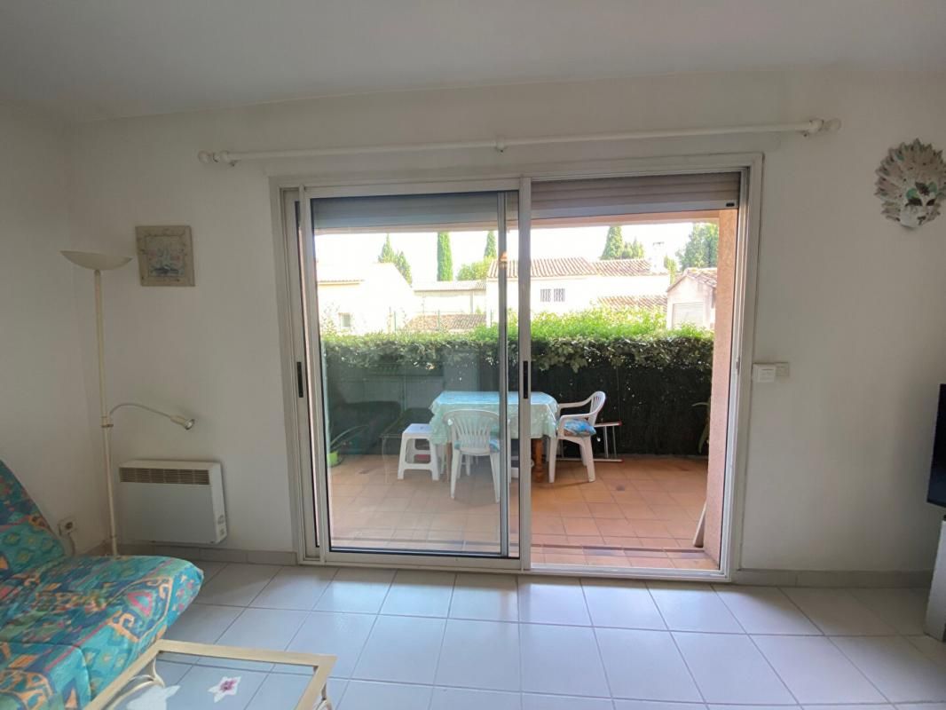 Appartement 2 pièces en rez de chaussée avec terrasse et garage