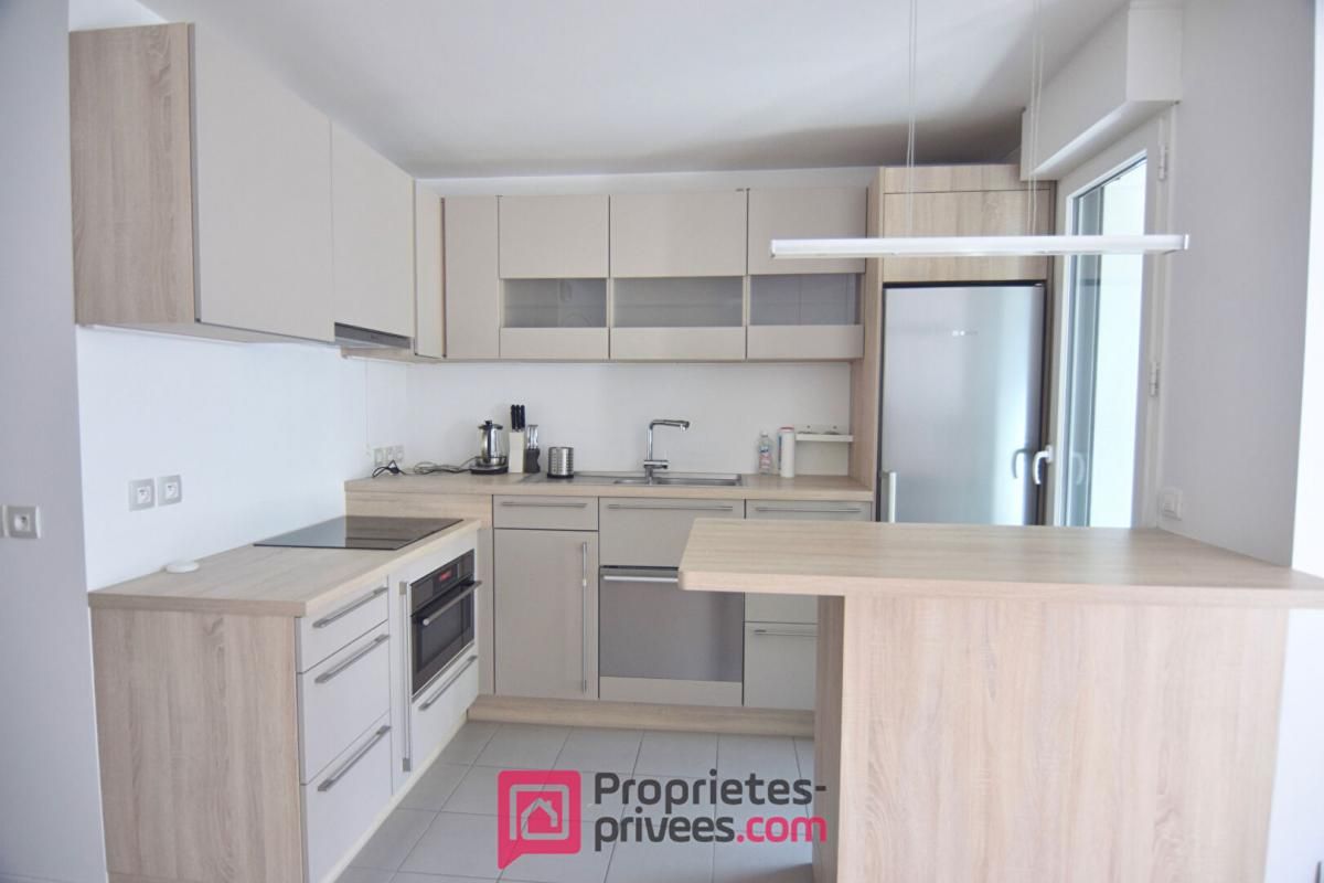 BOULOGNE-BILLANCOURT Appartement 3 pièces 66,03 m² Carrez avec 18 m² de jardin d'hiver et 8 m² de balcon filant 4