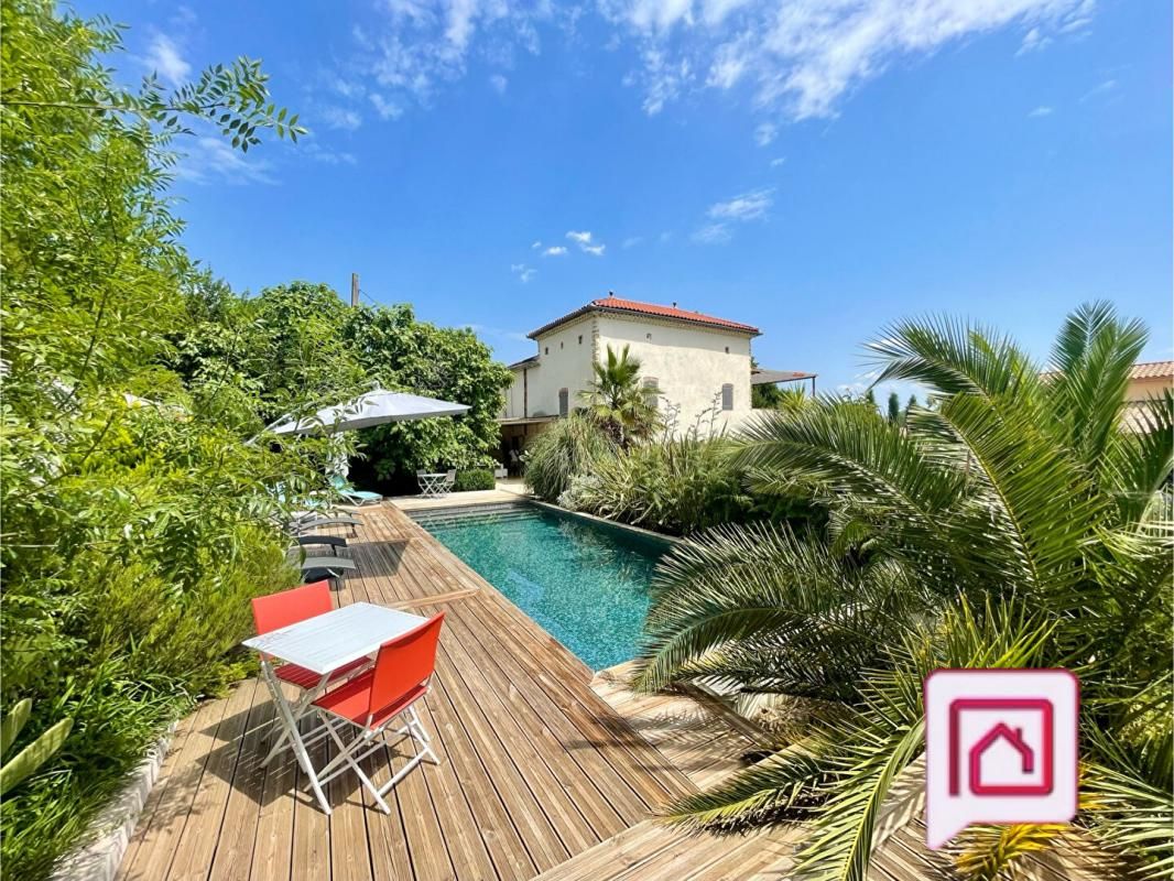 Ensemble immobilier composé d'une grande maison avec loft, 3 appartements et un studio