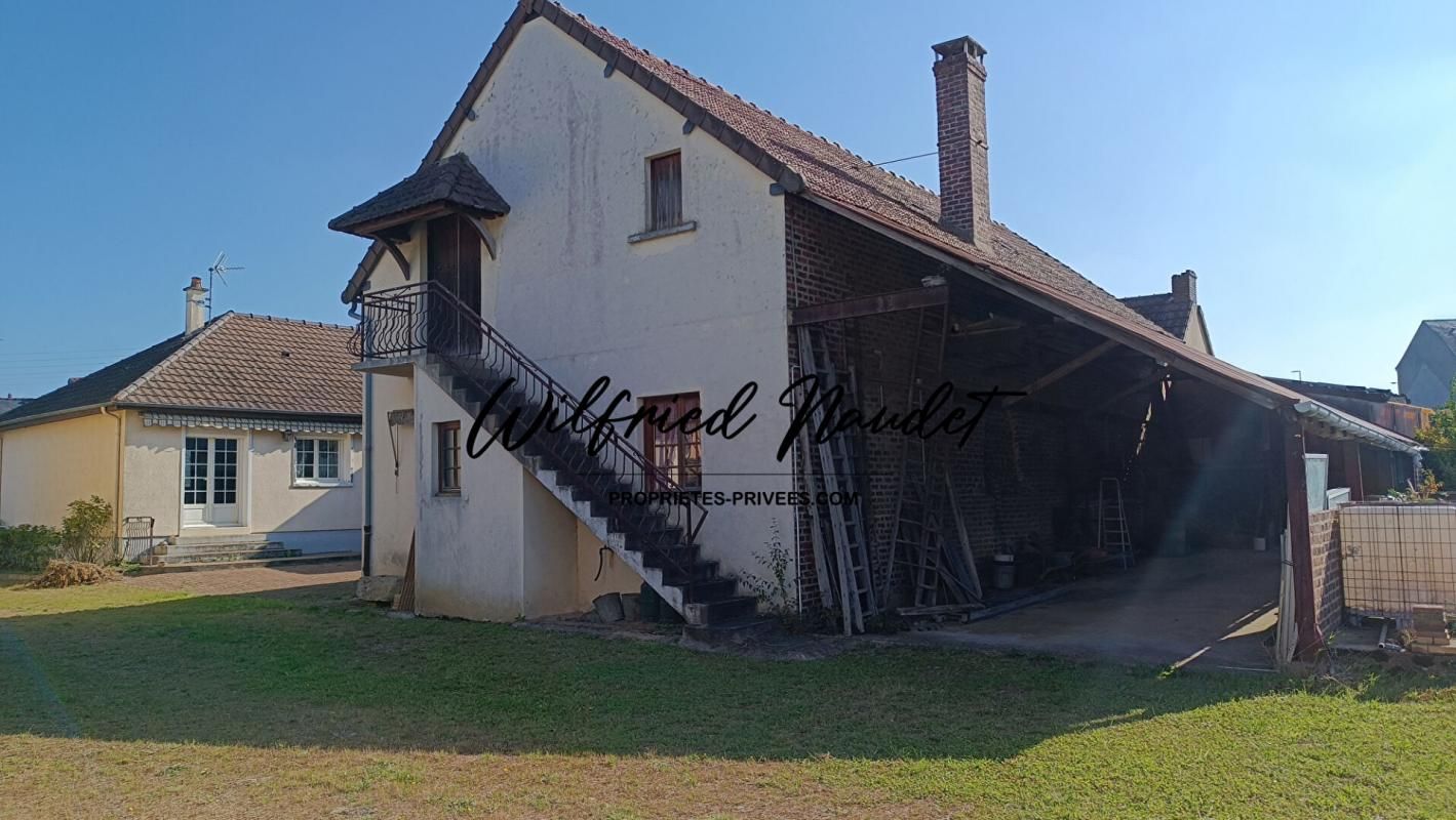 Ensemble Immobilier au Centre d'Ecommoy