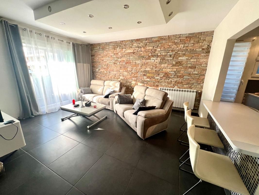 Appartement type 3 avec terrasse et place de parking privée