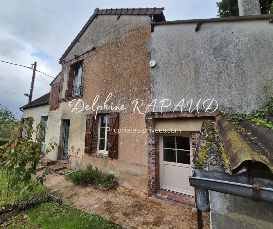 CONDE-SUR-HUISNE Maison mitoyenne à Sablons-Sur-Huisne avec potentiel d'agrandissement 2