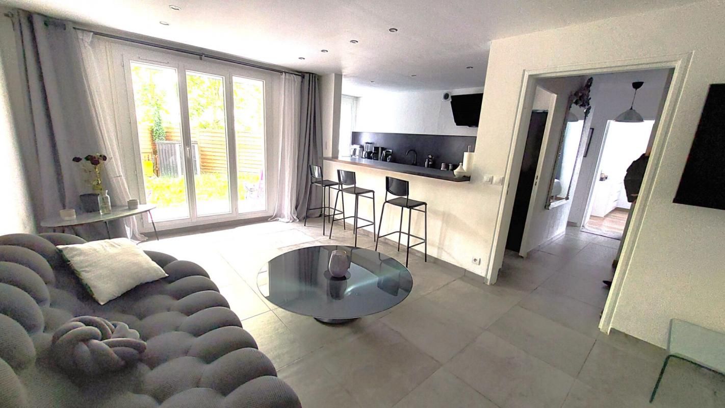 Appartement 3 pièce(s) 70 m2 RDC-JARDIN