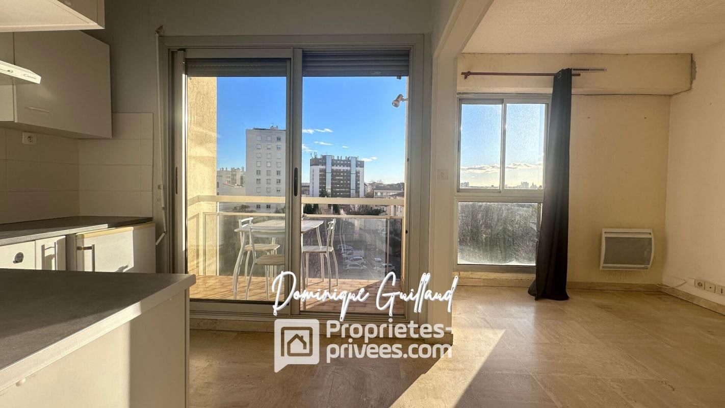 NIMES NÎMES-NOTRE DAME -STUDIO 27 M2-BALCON-PARKING 4