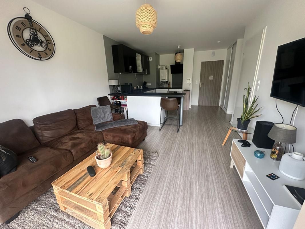 PONT-L'EVEQUE Appartement  plein Sud avec rez de jardin privatif 1