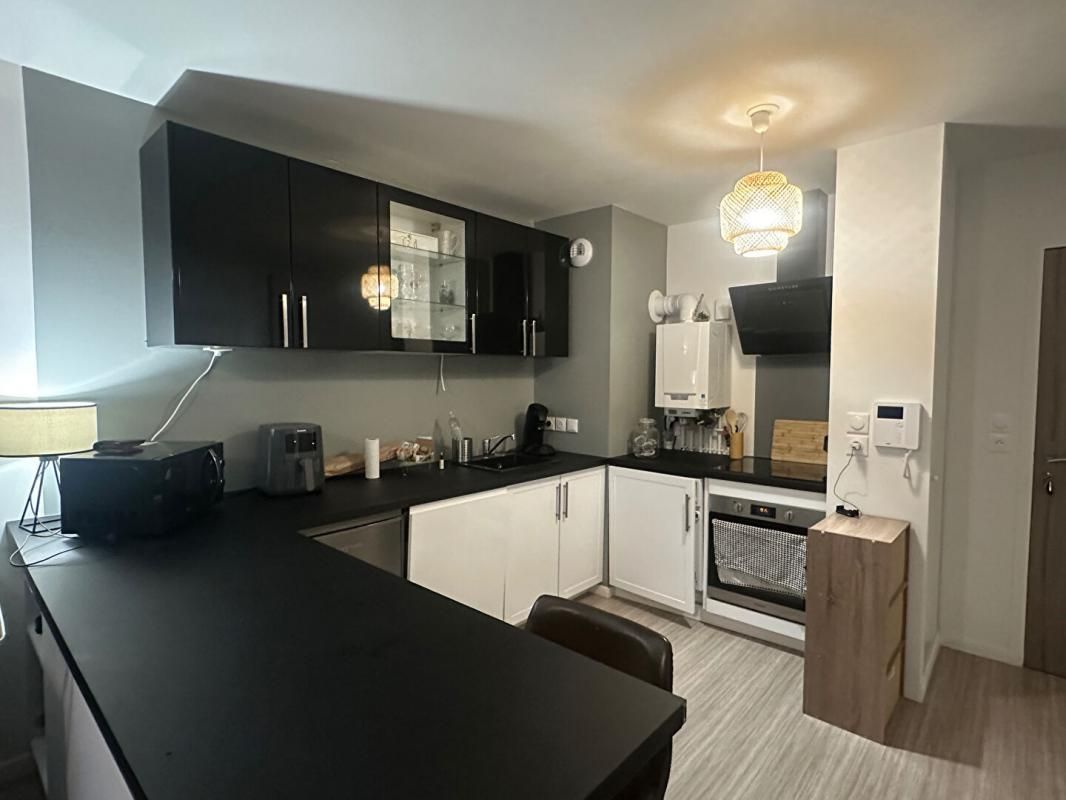 PONT-L'EVEQUE Appartement  plein Sud avec rez de jardin privatif 4