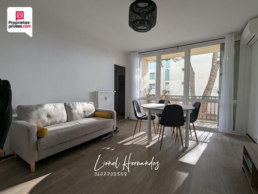 Appartement T3 rénové - 62,25m² avec 2 chambres, balcon, cave et parking