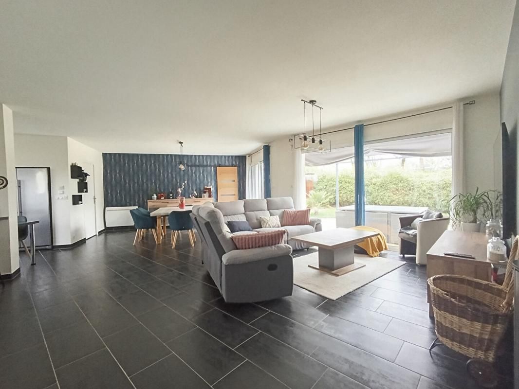 LE SOURN Maison de plain-pied et son appartement 3