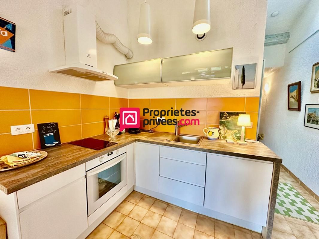 BORMES-LES-MIMOSAS Appartement 2 pièces avec terrasse, garage et une place de parking privative 4