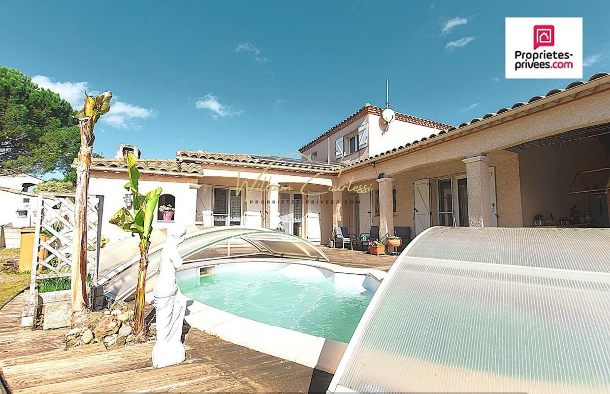 Maison 7 pièce(s) 130 m2 Piscine Garage et dépendance