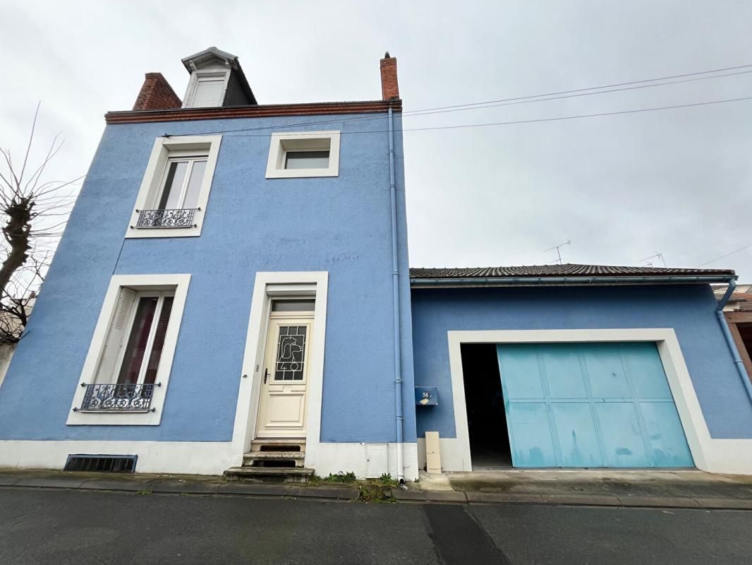 Maison de ville Vichy 7 pièce(s) avec garage et cour intérieure