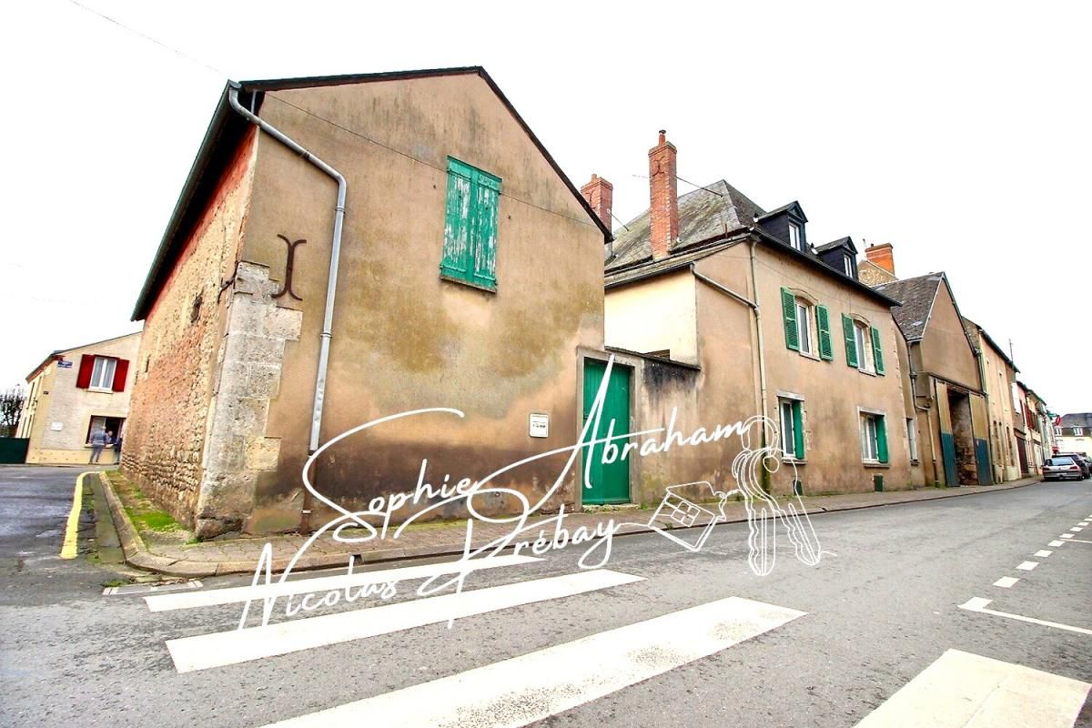 Ensemble immobilier composé d'une habitation et des dépendances