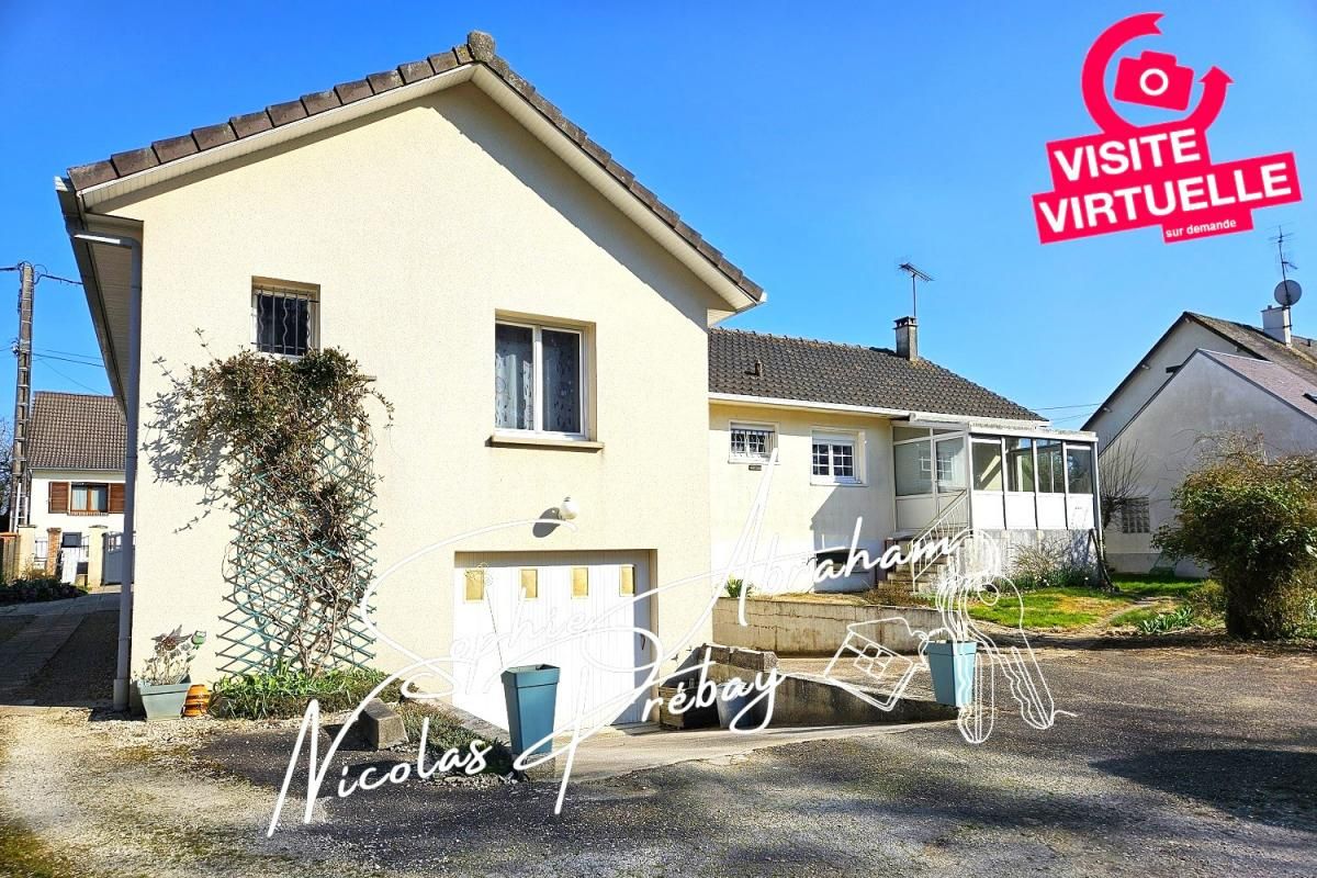 Ensemble immobilier composé de deux habitations avec sous-sol et terrain