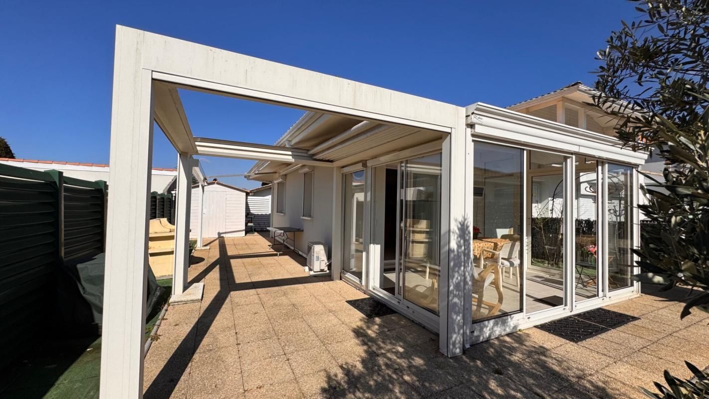 ARES MAISON DE VILLE P-PIED, TYPE 3, JARDINET ET TERRASSE 3