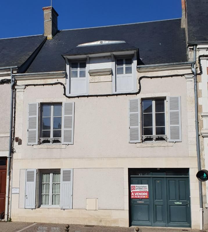Maison d'habitation divisée en 2 appartements indépendants