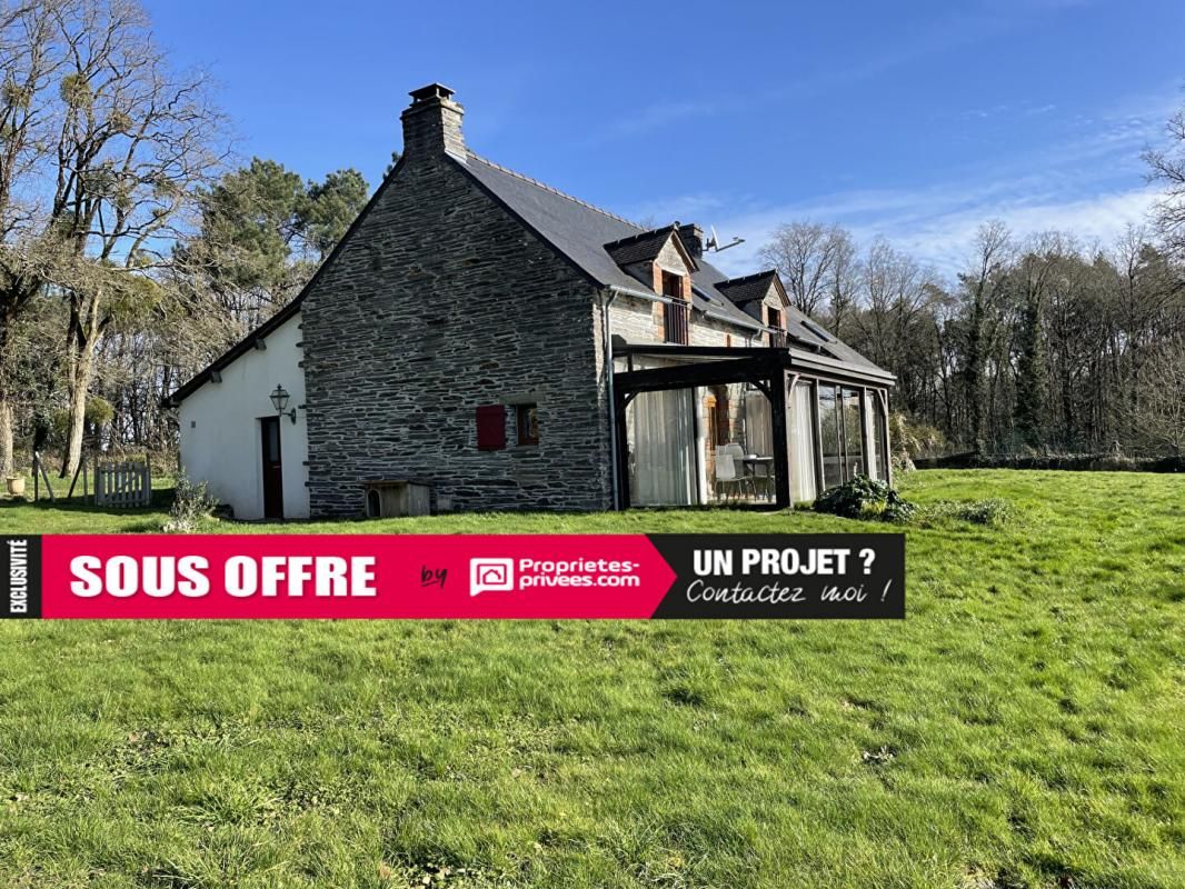 LONGERE ATYPIQUE ET SON TERRAIN BOISE