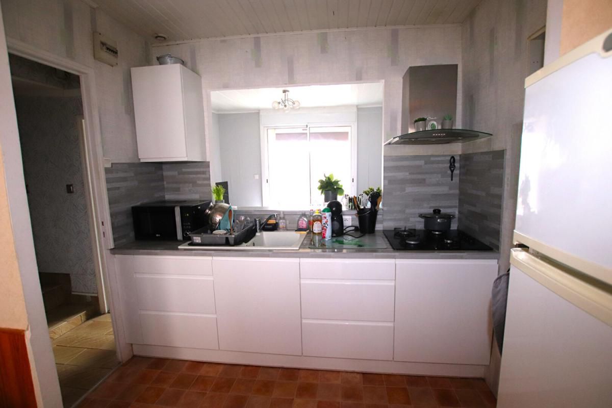 SAINT-ROME-DE-TARN Immeuble 2 appartements + 2 commerces 3